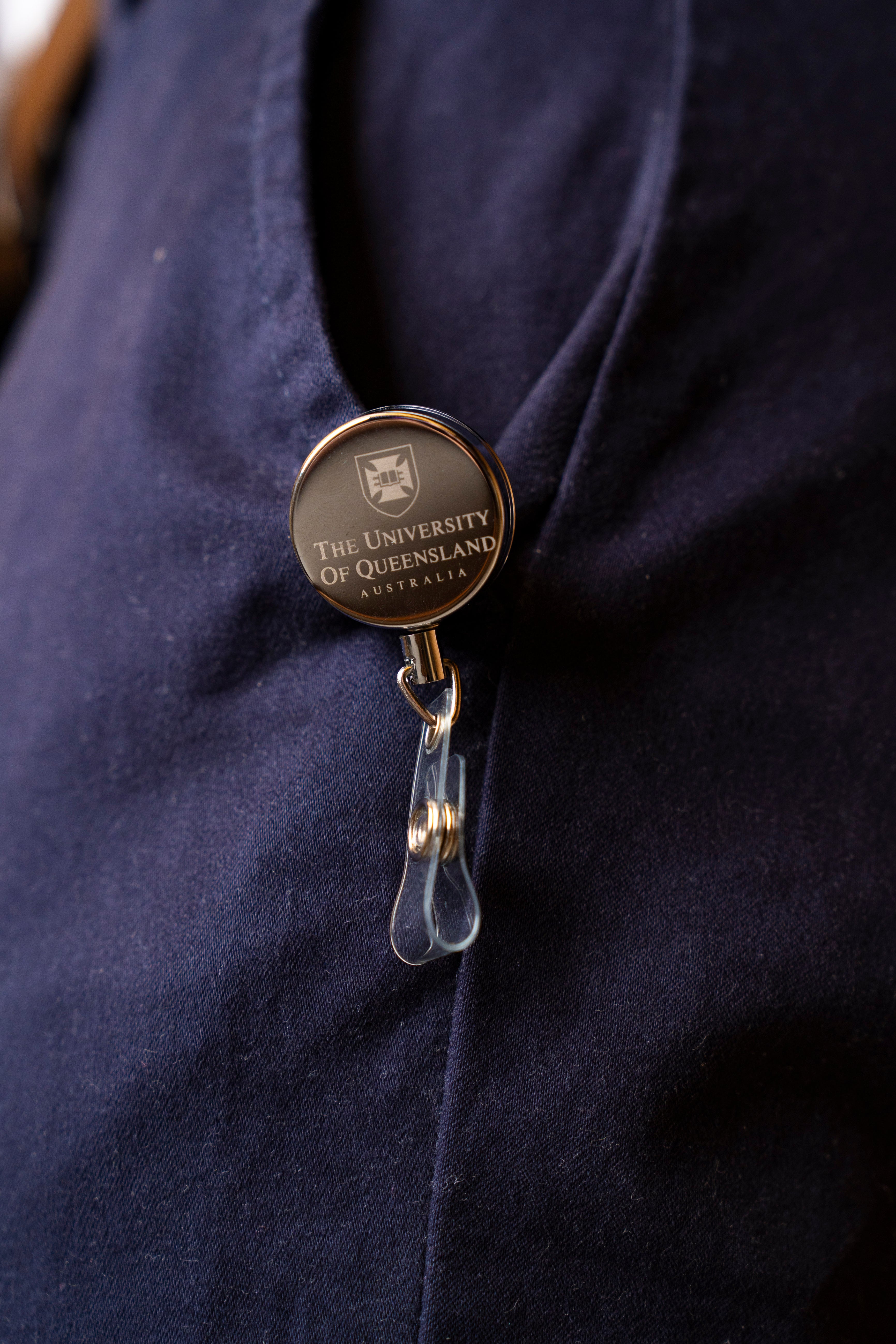 UQ Shield Metal Zip Pull Badge Holder